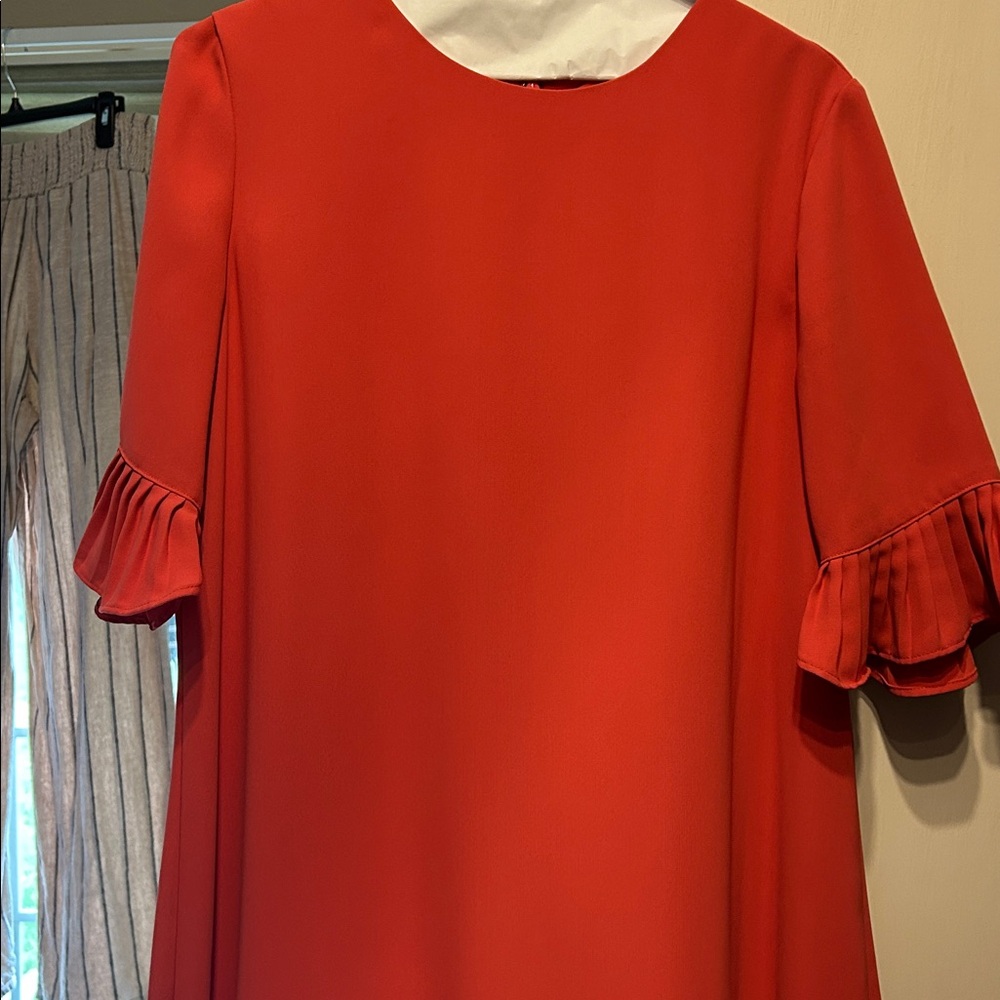 Elegant Dark Coral Dress with Ruffled Sleeves & Bottom.